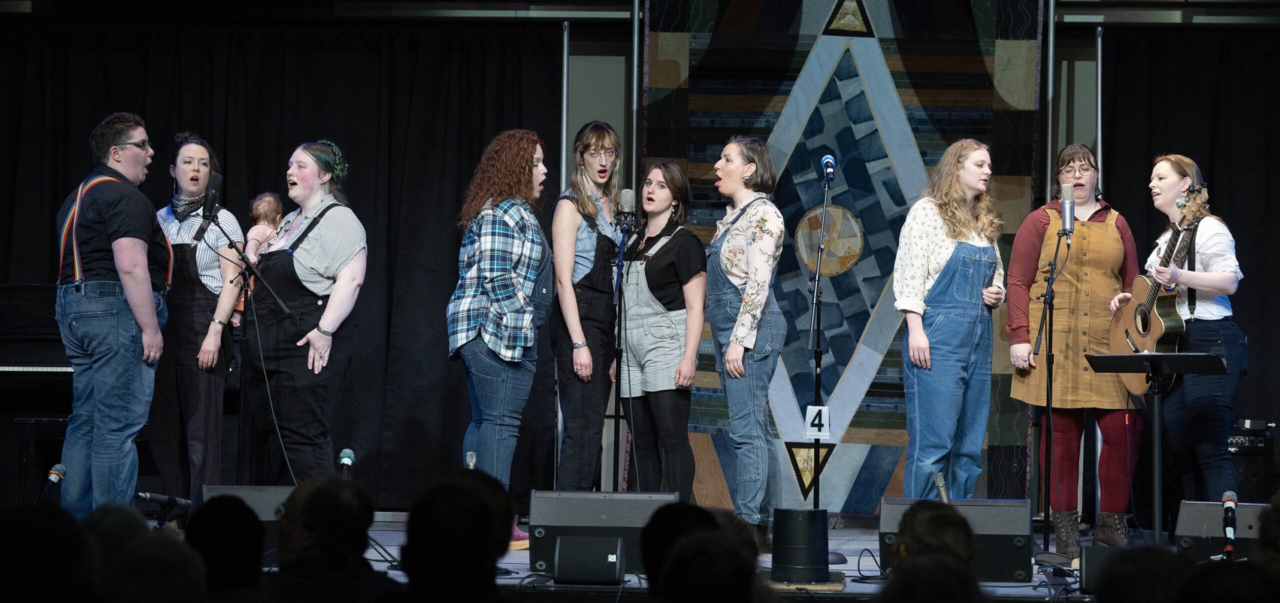 Photo of Queens on the Alaska Folk Fest stage in 2025, photographed by Brian Wallace.